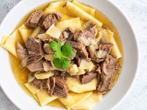 Traditional Kyrgyz meat and noodle dish Bashbarmak
