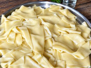 Homemade Bashbarmak with tender beef and flat noodles