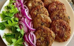 Kuku Adas with potatoes