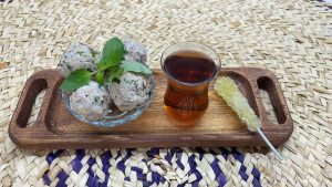 Doimaj with tea and candy