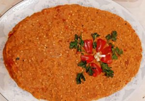 Mirza Ghasemi in a dish with vegetable decoration