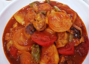 Yatimche with onion rings