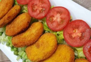 Chicken cheese cutlets with tomato and vegetables