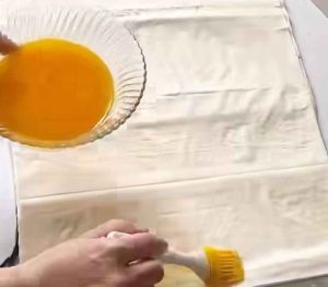 Buttering the Baghlava Dough