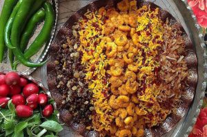 Meygoo Polo Shrimp pilaf with fried onions and raisins