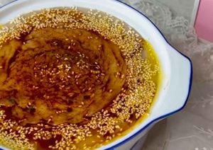 persian halim with sesame and cinnamon powder