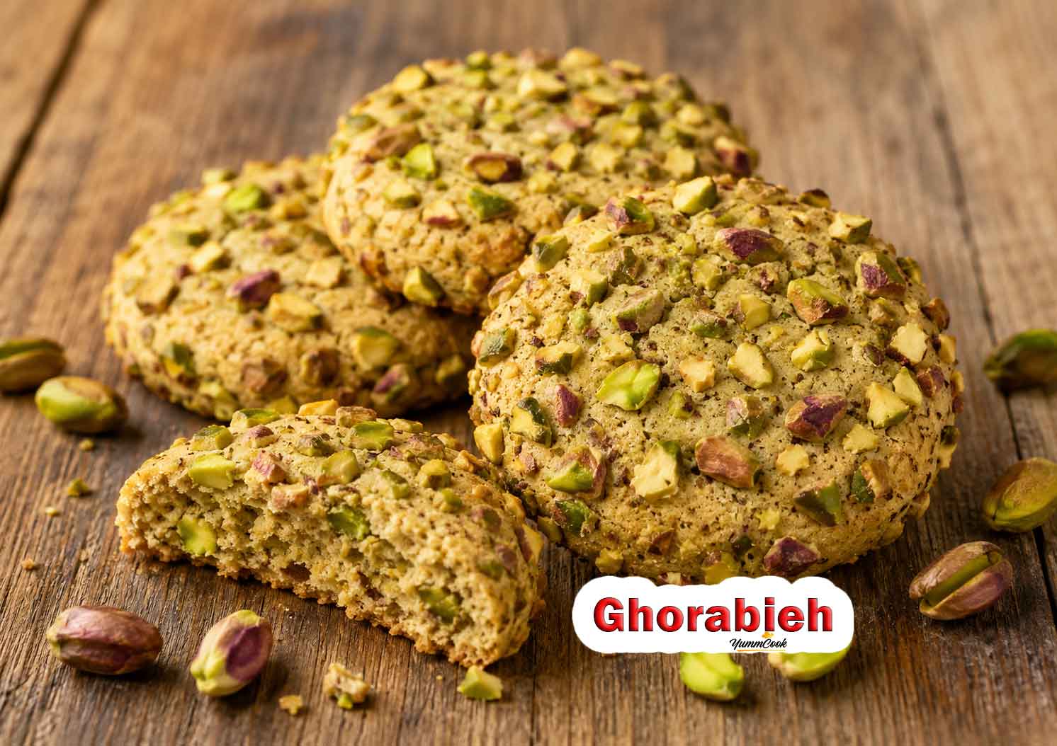 Traditional Persian Ghorabieh cookies topped with pistachios