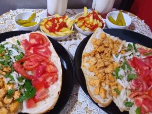 Tantuni sandwich with tomatoes and chopped vegetables