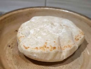 Bazlama bread in a frying pan