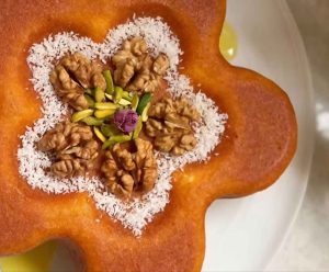 Khagineh dessert with flower design and pistachios