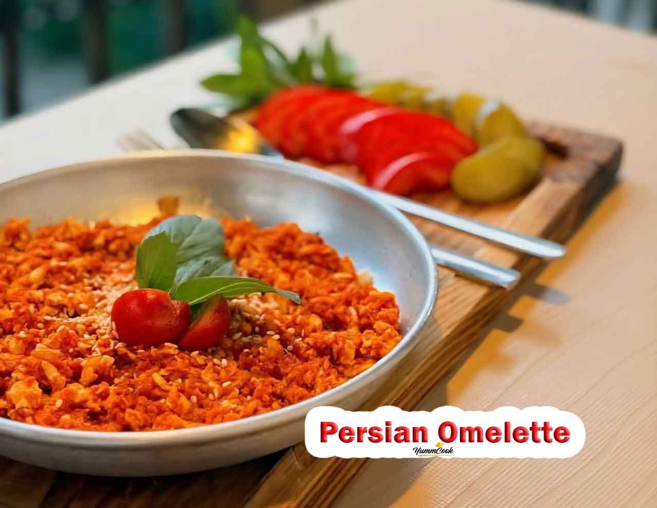 Authentic Persian Omelette made with fresh tomatoes, eggs, and turmeric.