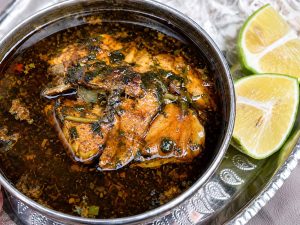 Southern Iranian Ghalie Mahi fish stew served with rice