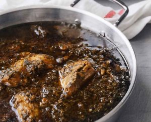 Persian fish stew with tamarind, garlic, and fresh herbs