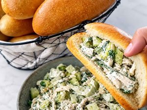Homemade chicken sandwich with shredded chicken and pickles