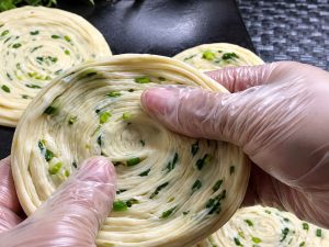 Rolling Katlama dough 