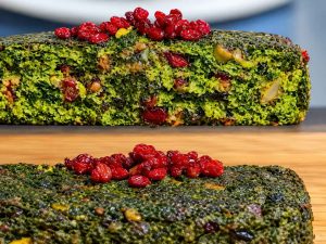 Sliced Kookoo Sabzi with fresh herbs