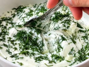 Creamy Turkish Eggs topped with fresh dill