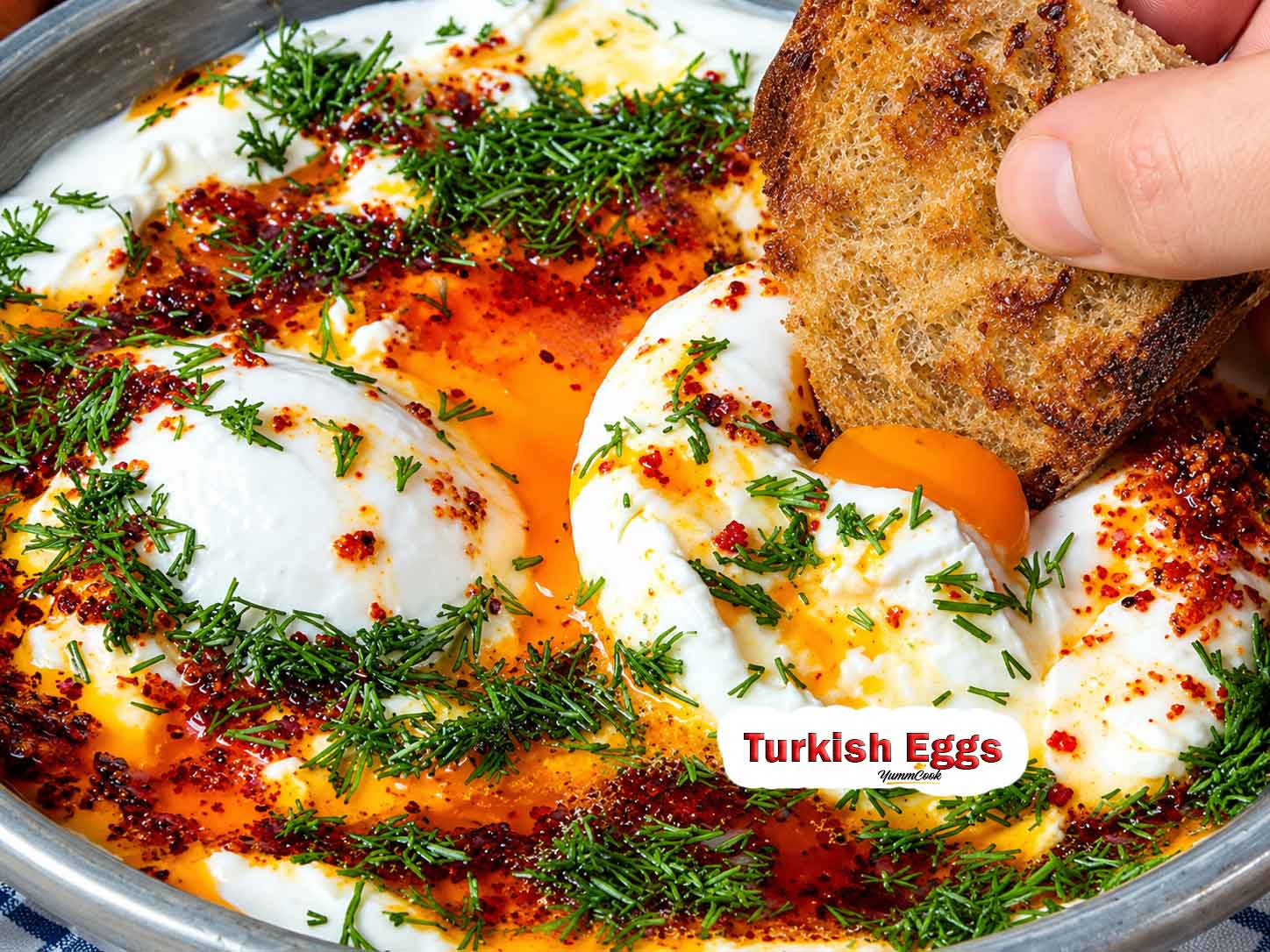 Creamy Turkish Eggs topped with fresh dill